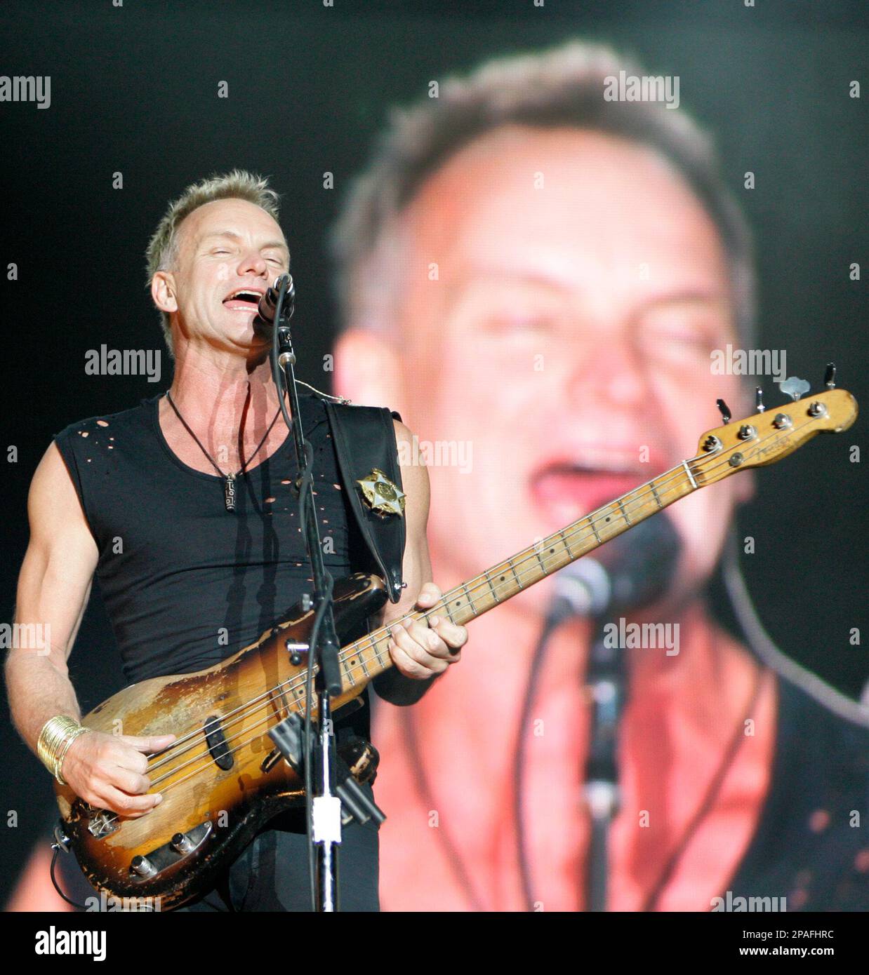 Lead vocalist and bassist Sting of The Police performs during a concert ...