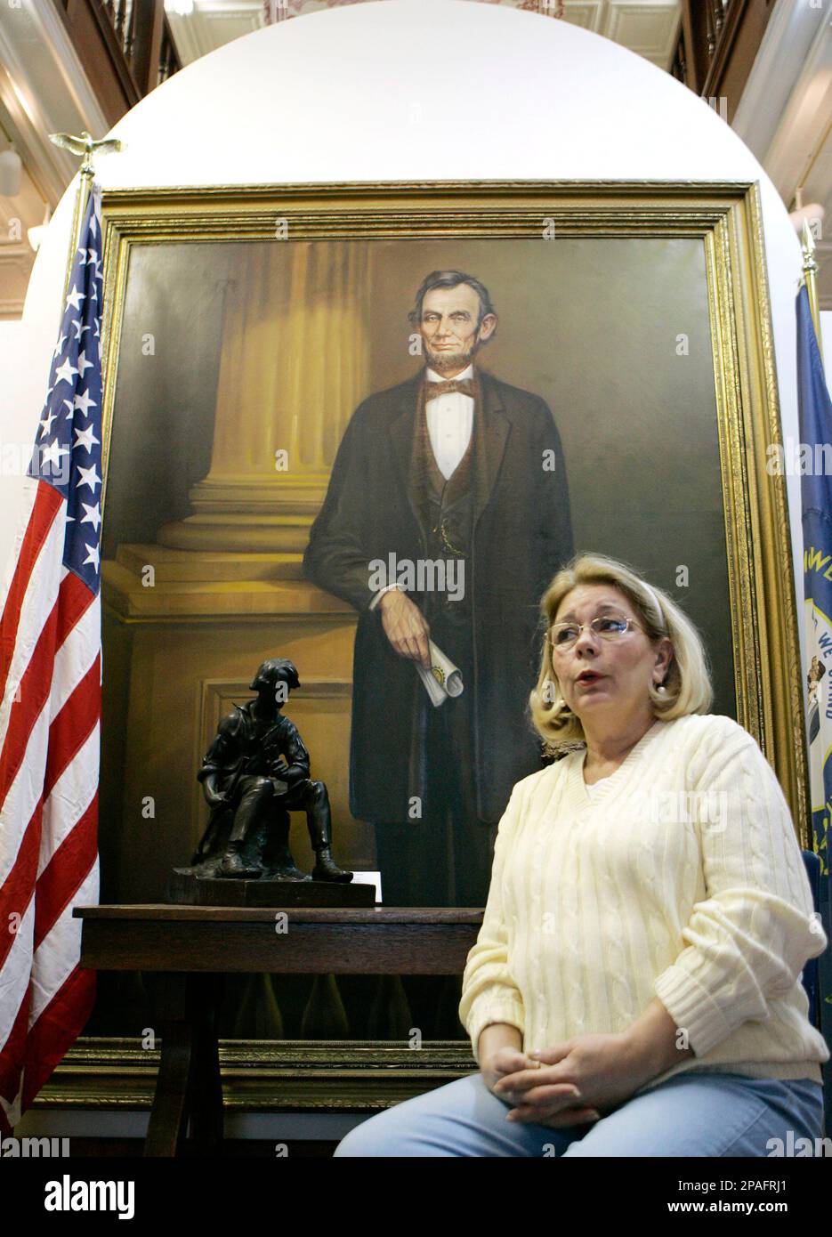 ** FOR IMMEDIATE RELEASE ** Museum Director Iris LaRue sits in front of