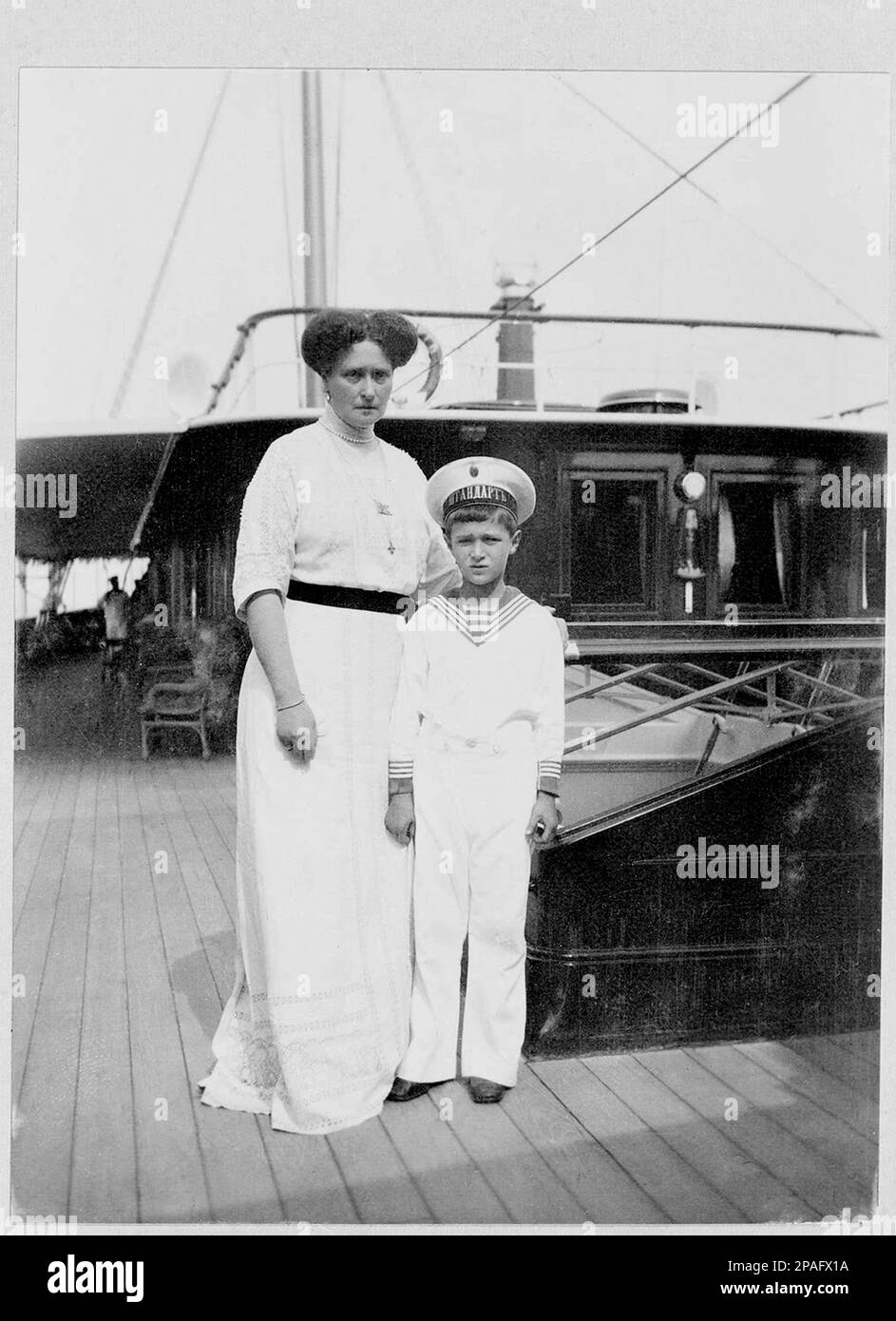 The russian crownprince Grand Duke Tsarevich ALEXEI Nikolaevich ROMANOV (1904 - 1918 ) with mother ALEXANDRA , born Princess Alix of Hesse and by Rhine ( 1872 - 1918 ).  The the youngest child and the only son of Tsar Nicholas II of Russia and Alexandra Fyodorovna .  His mother's reliance on the starets Grigori Rasputin to treat Alexei's haemophilia helped bring about the end of Imperial Russia. His murder following the Russian Revolution of 1917 resulted in his canonization as a passion bearer of the Russian Orthodox Church. He was two weeks shy of his fourteenth birthday when he was murdered Stock Photo