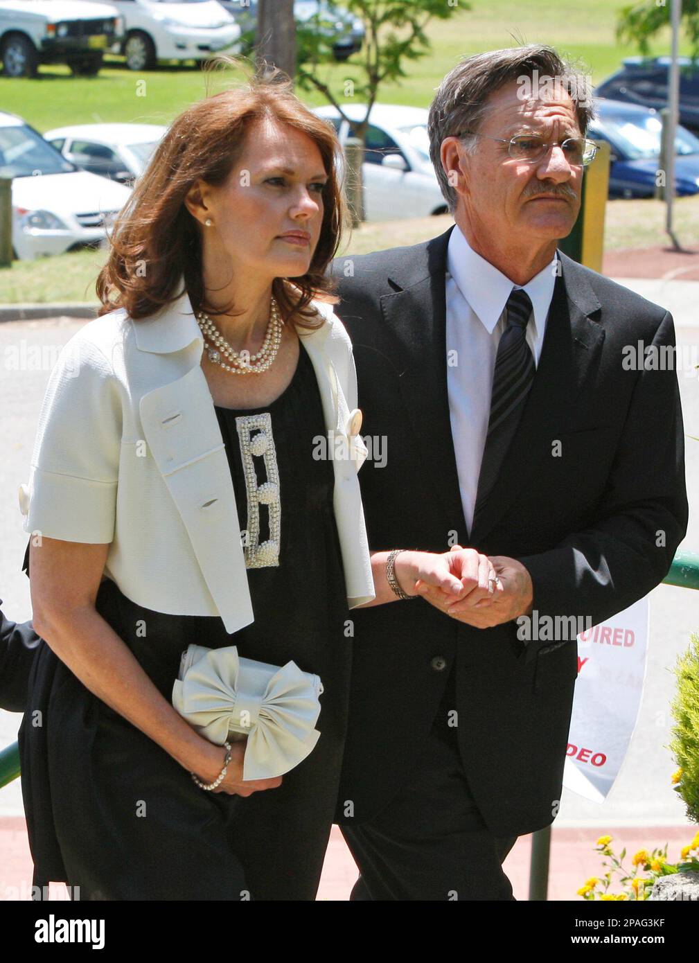 Sally LedgerBell, left, and her husband Roger Bell arrive at a