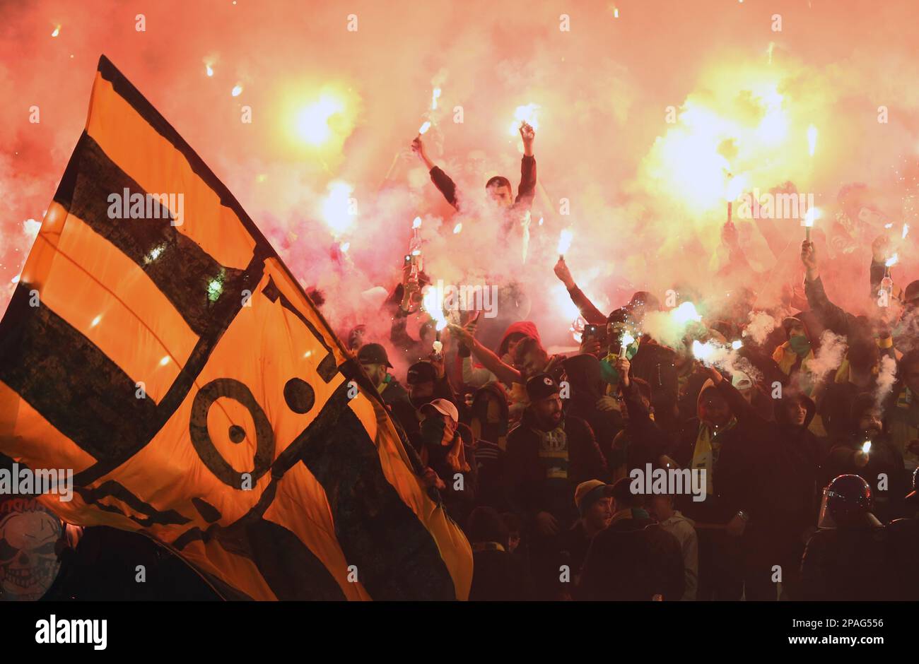 Algiers. 12th Mar, 2023. Fans cheer for their teams during the CAF Champions League 2023 football match between JS Kabylie of Algeria and AS Vita Club of DR Congo at 5th July Stadium in Algiers, Algeria, March 11, 2023. Credit: Xinhua/Alamy Live News Stock Photo