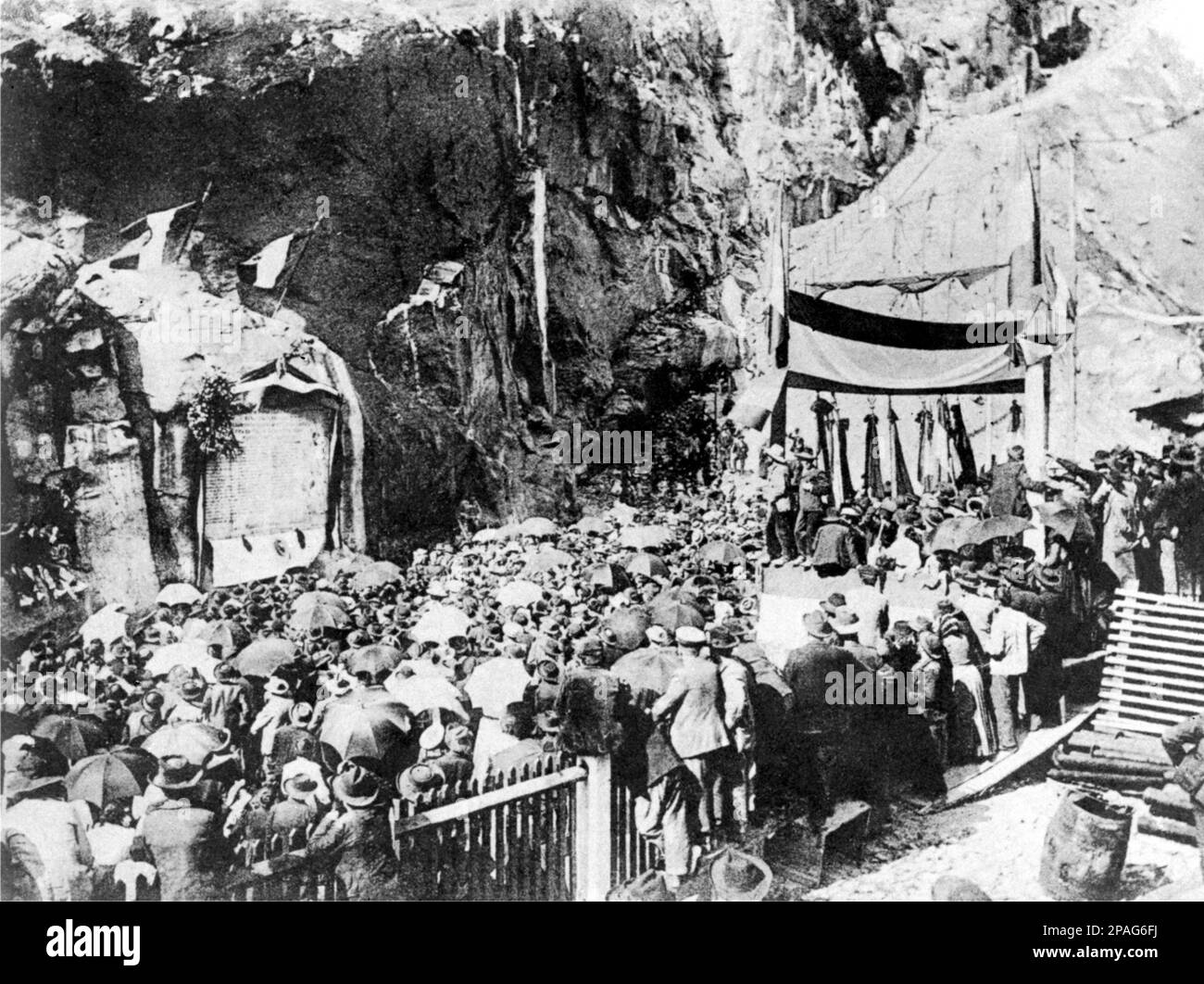 1905, TRAFORO DEL SEMPIONE ,  ITALY : The commemoration of 28 may 1905 for 58 workers dead during the works for the tunnel  Iselle to Briga ( Brig ) , at last opened the day 19 may 1906. The Simplon Tunnel is an Alpine railroad tunnel that connects the Swiss town of Brig with Domodossola in Italy, though its relatively straight trajectory does not run under Simplon Pass itself. It actually consists of two single-track tunnels built nearly 20 years apart. For more than half a century it was considered to be the longest tunnel in the world. Simplon tunnel was finally completed in 1906. The Itali Stock Photo