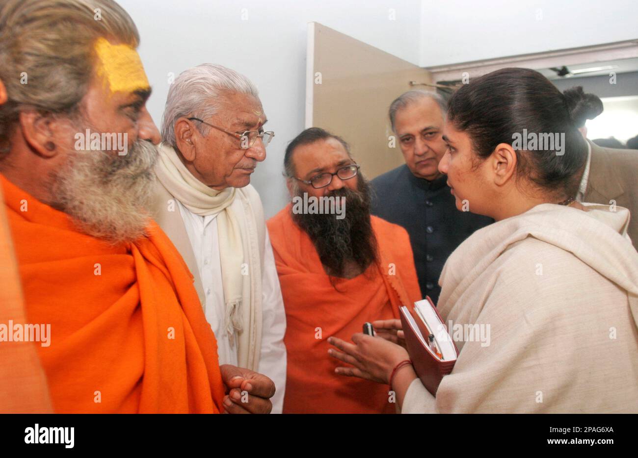 Members of the Maharishi Mahesh Yogi Cremation committee, left to right ...
