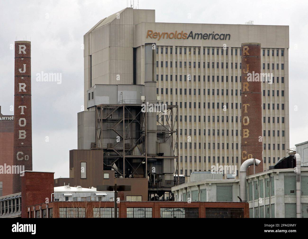 second largest tobacco company Smokestacks of an old R.J. Reynolds Tobacco plant frame the Reynolds  American building in Winston-Salem, N.C., Wednesday, Feb. 6, 2008. Reynolds  American Inc., the nation's second-largest tobacco company, said Thursday  its fourth-quarter