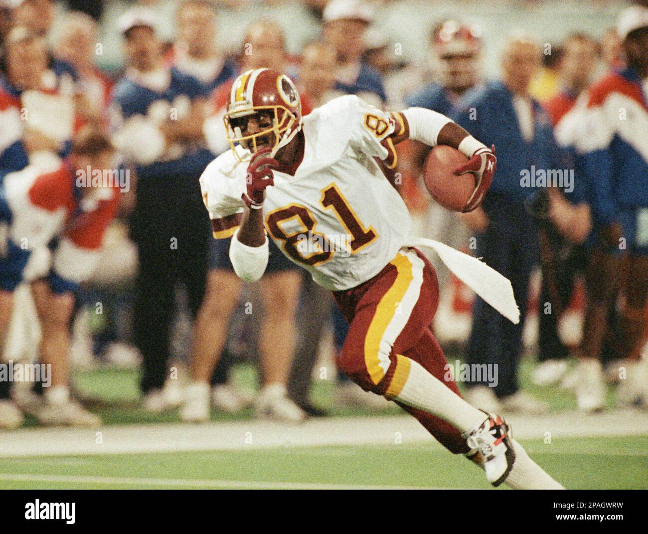 FILE ** Washington Redskin wide receiver Art Monk picks up yardage after  pulling in a pass during first quarter of Super Bowl XXVI football game  against the Buffalo Bills in Minneapolis,