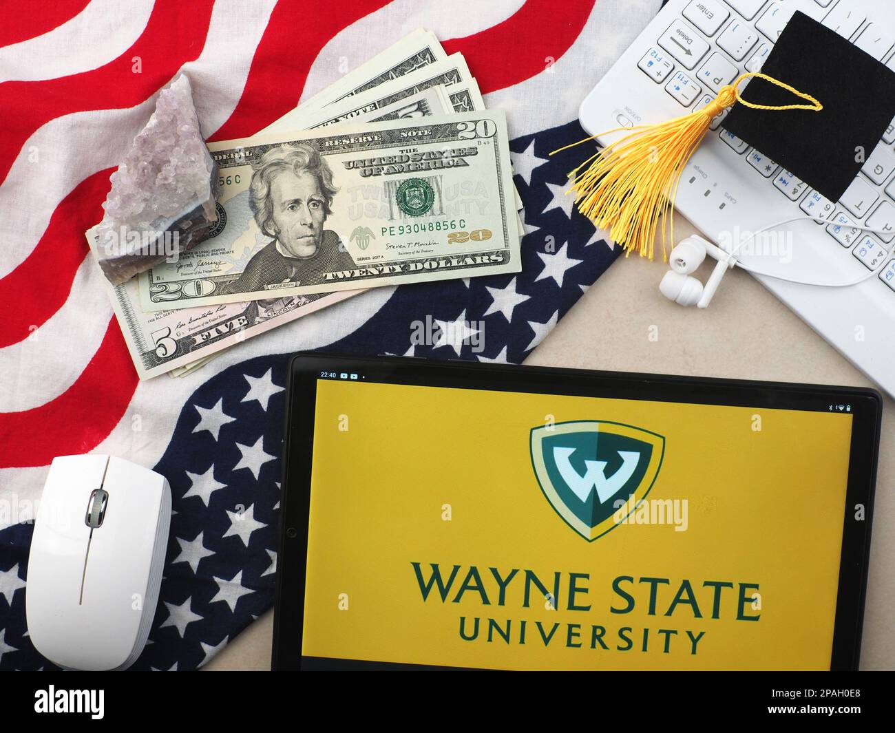 In this photo illustration, Wayne State University  logo seen displayed on a tablet. Stock Photo