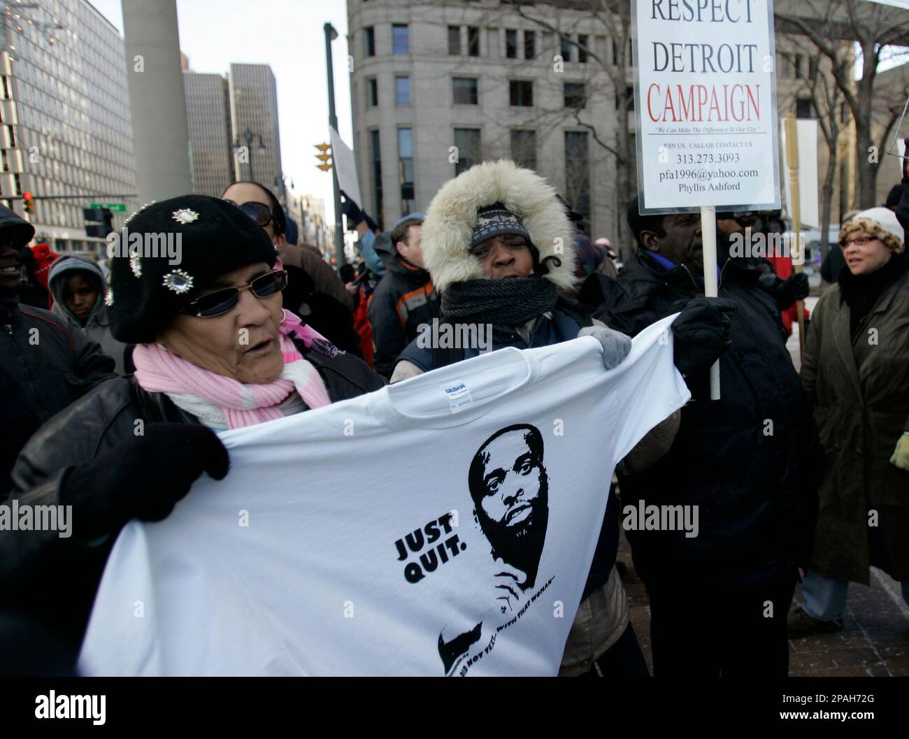 Joann Jackson, 63, carries a white T-shirt bearing a depiction of ...