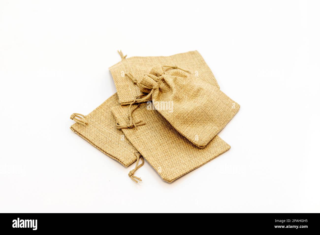 Jute sack bags for gifts isolated on white background. selective focus Stock Photo