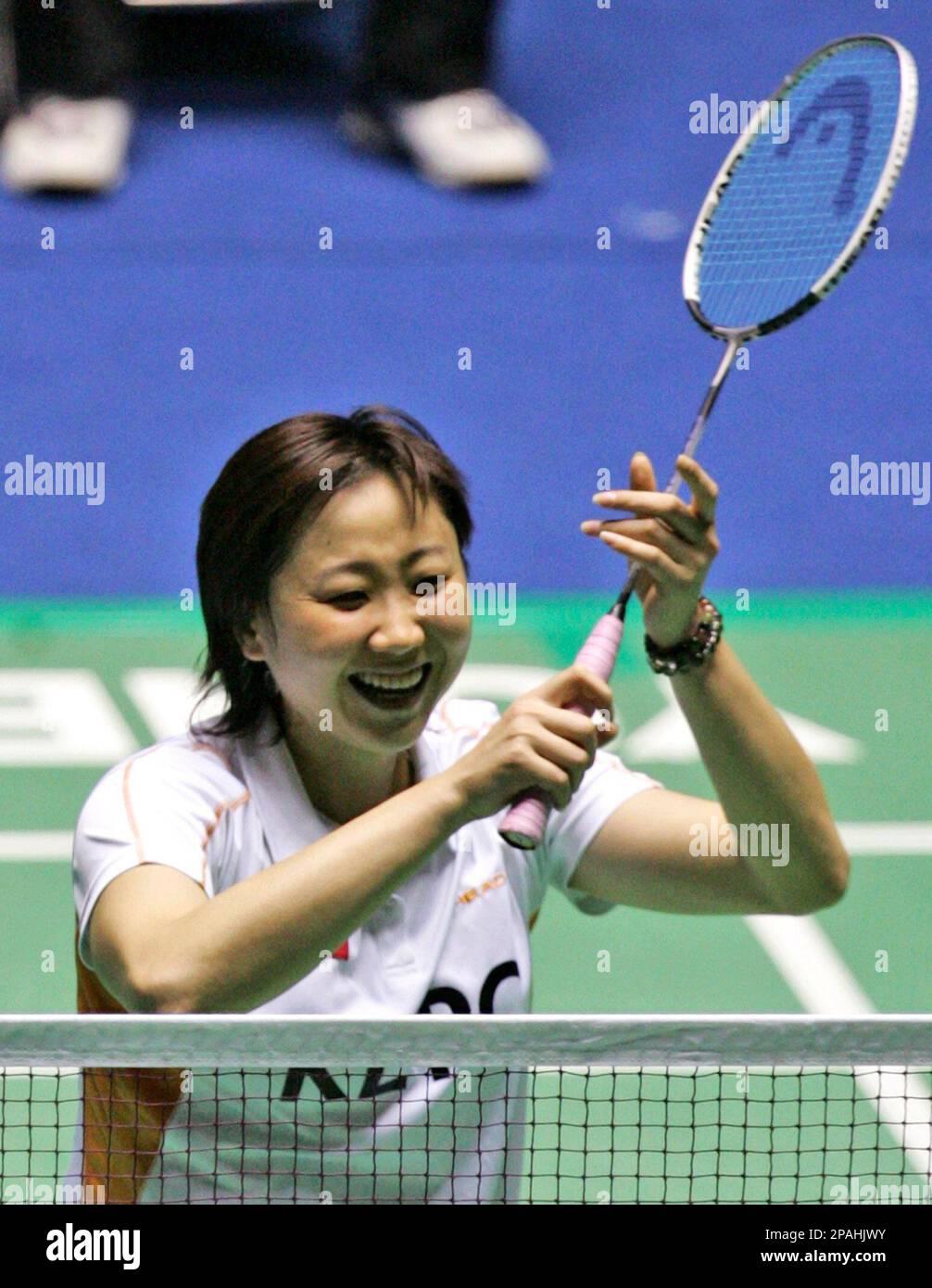 Hong Kong's Mi Zhou reacts after wining against China's Lan Lu during ...