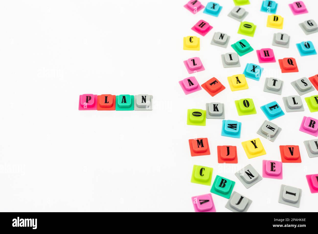 PLAN word with colorful letters isolated on white background Stock