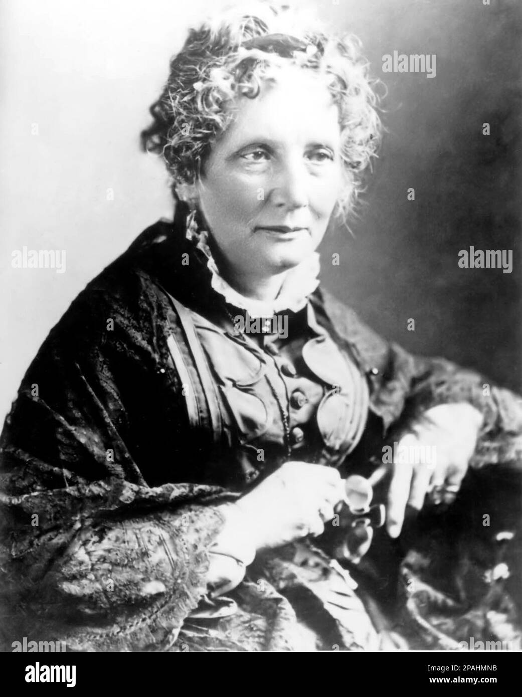 The american abolitionist and novelist , woman writer , HARRIET BEECHER STOWE ( 1811 - 1896 ) author of most celebrated book UNCLE TOM 'S CABIN ( 1852 ) attacked the cruelty of slavery; it reached millions as a novel and play, and became influential, even in Britain. It made the political issues of the 1850s regarding slavery tangible to millions, energizing anti-slavery forces in the American North. It angered and embittered the South. The impact is summed up in a commonly quoted statement apocryphally attributed to Abraham Lincoln. When he met Stowe, it is claimed that he said, 'So you're th Stock Photo