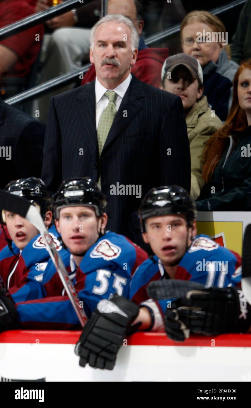 L-R) Colorado Avalanche players Milan Hejduk, John-Michael Liles, Curtis  Leschyshyn, and head coach Joel Quenneville model four generations of NHL Avalanche  jerseys at the Pepsi Center in Denver on September 12, 2007.