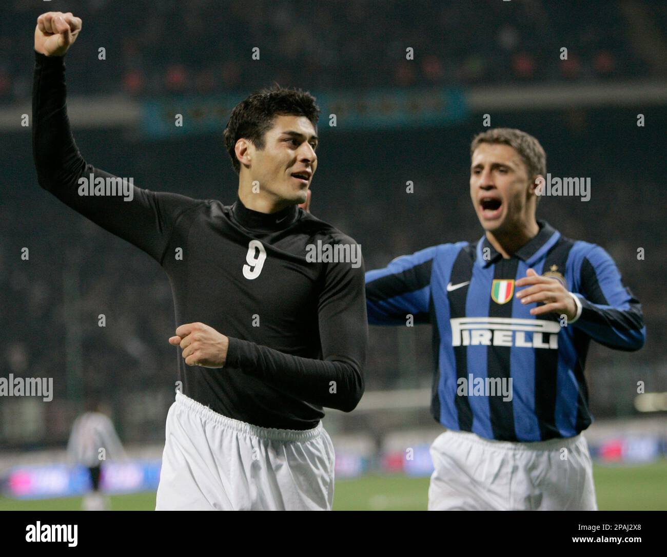 Inter Milan Argentine forward Julio Cruz, left, celebrates with his  teammate Argentine forward Hernan Crespo after scoring against Juventus  during an Italy Cup quarterfinal first leg soccer match at the San Siro