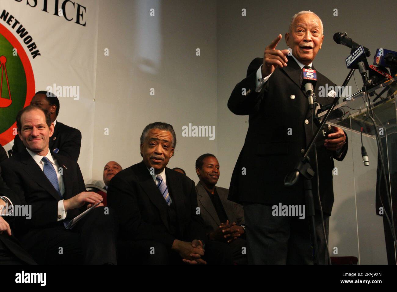 Governor of new york eliot spitzer left and rev al sharpton