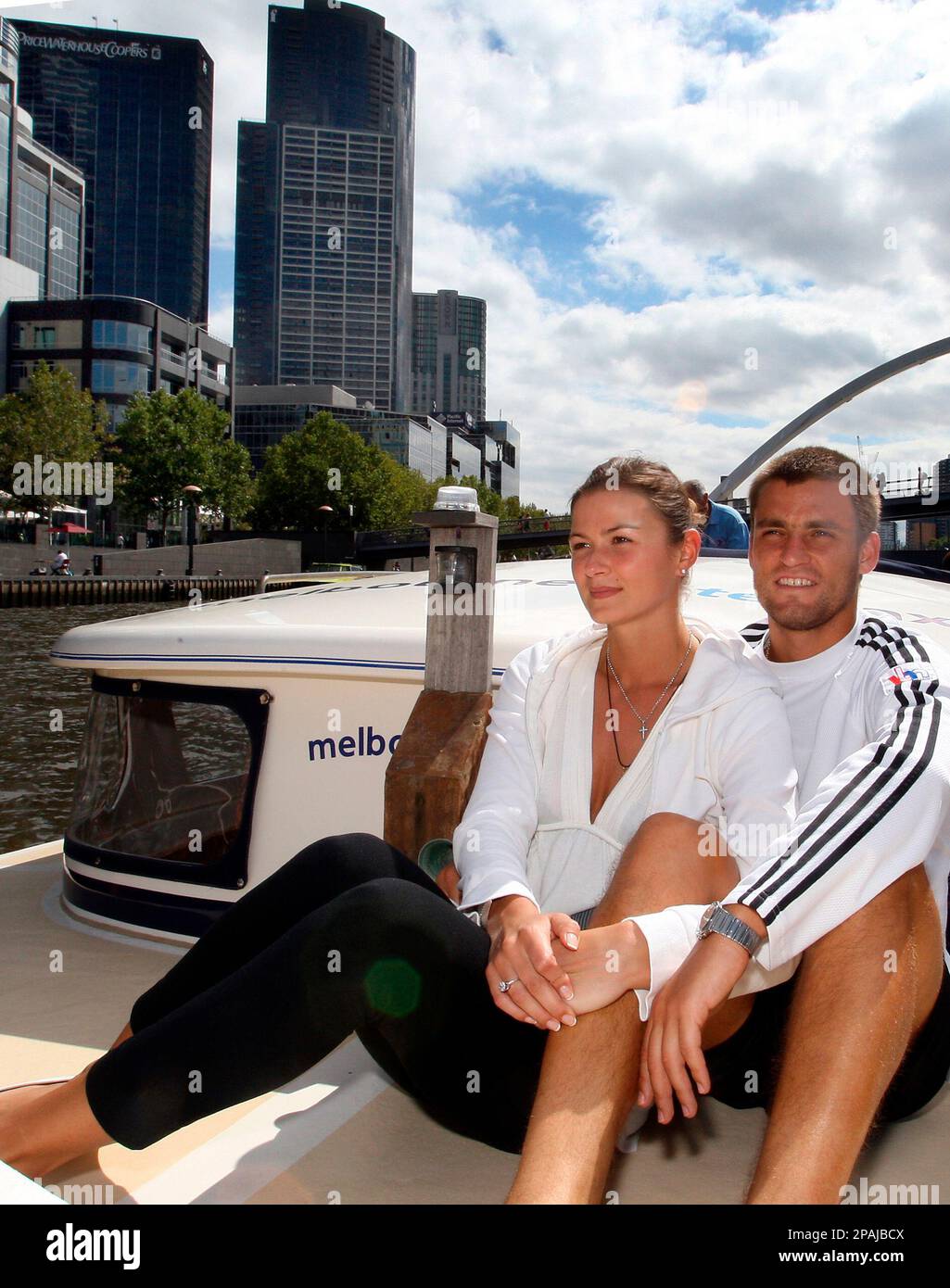Russian tennis player Mikhail Youzhny and his girlfriend Julia Thomas ...
