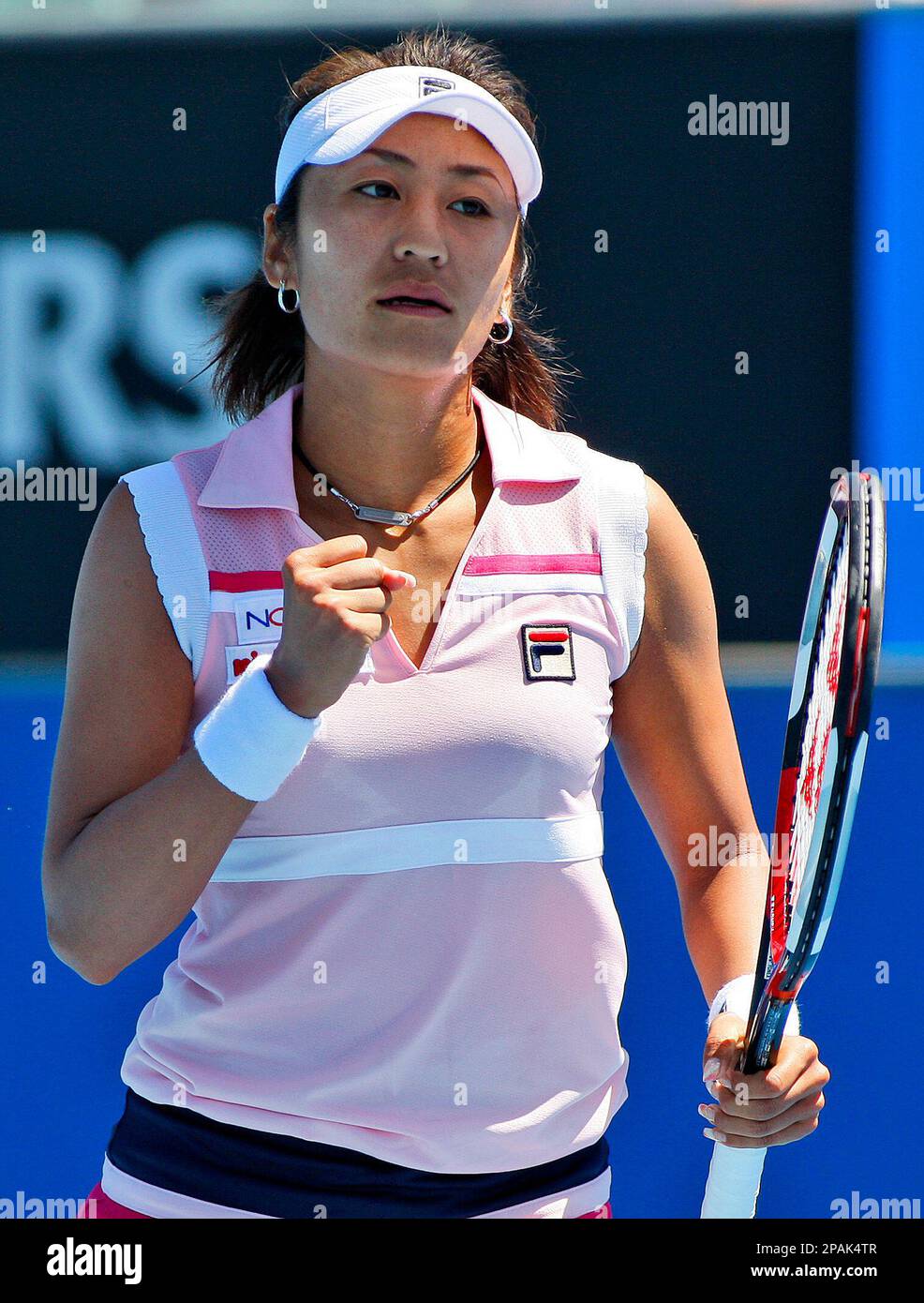 Japan's Akiko Morigami reacts as she plays Michaela Krajicek of the Netherlands during a first round match against at the Australian Open tennis championships in Melbourne, Australia, Tuesday, Jan. 15, 2008. (AP Photo/Mark Baker) Stock Photo