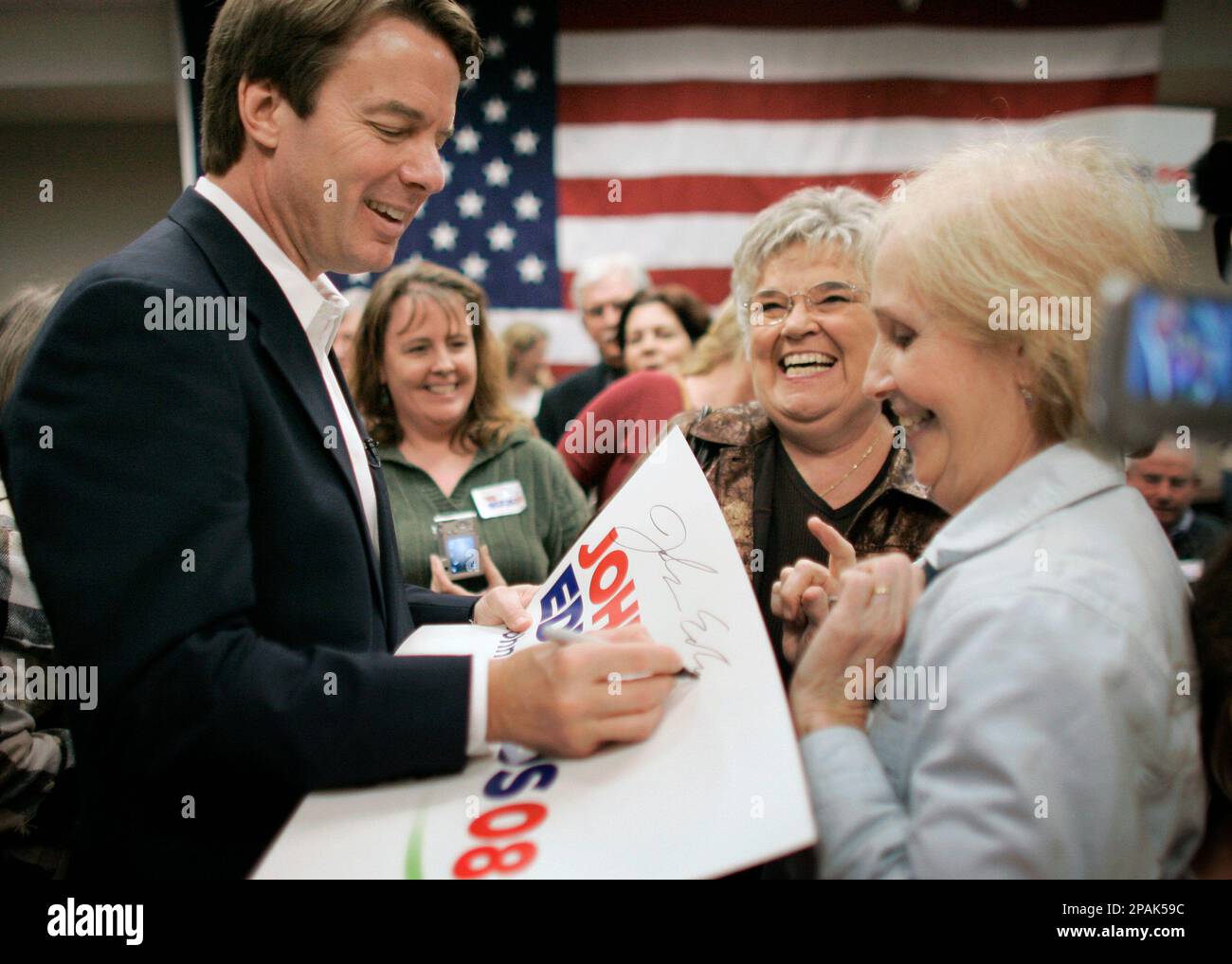 Sen. John Edwards, D-N.C., left, and his father, Wallace, right, share a  laugh at Edwards' boyhood home in the Utica Mill community Sunday, June 8,  2003, in Seneca, S.C. The Democratic presidential