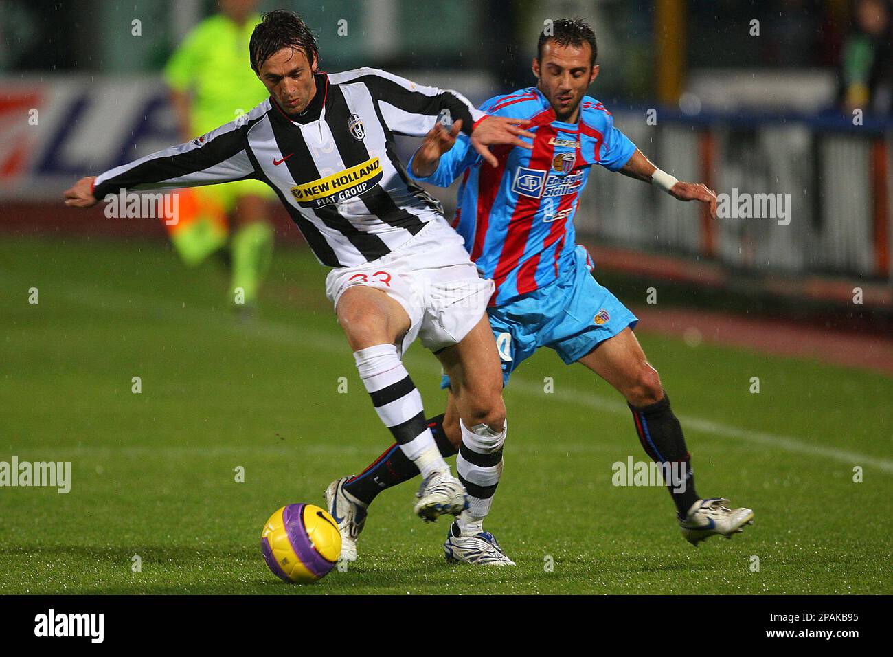 Catania's Giuseppe Mascara, right, and Juventus' Nicola Legrottaglie, fight  for the ball during a major league soccer match at the "Massimino" stadium  in Catania, Sicily, Saturday, Jan. 12, 2008. The game ended