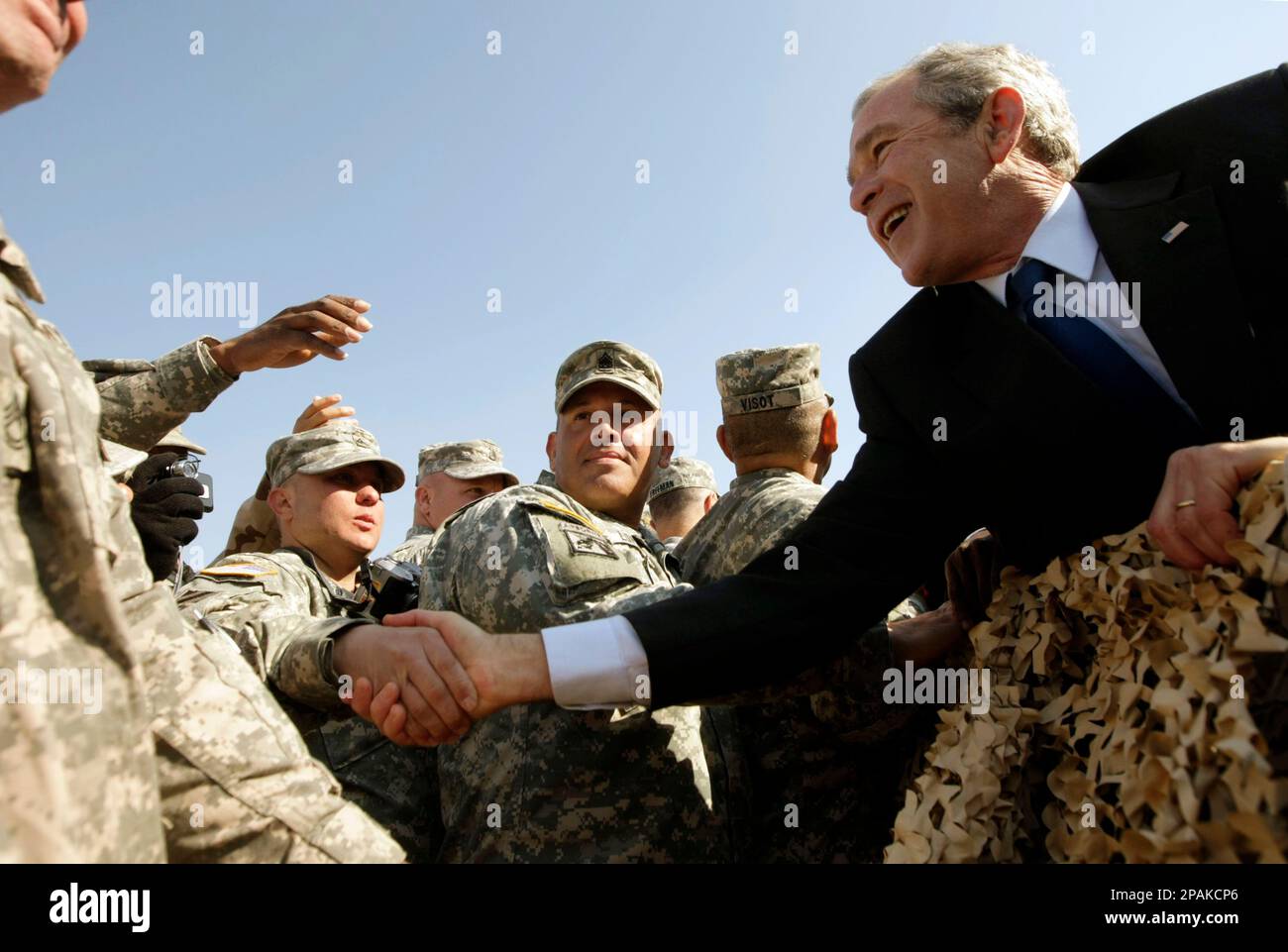 US President W. Bush greets military personnel, Saturday, Jan