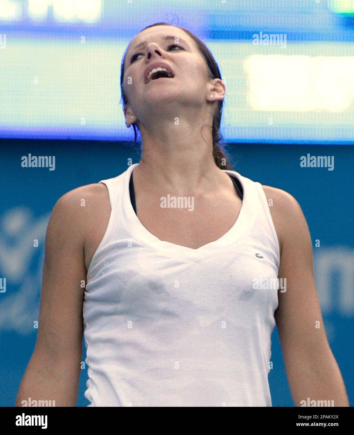 France's Camille Pin reacts to a missed shot in her first round match against Nicole Vaidisova of the Czech Republic at the Sydney International tennis tournament in Sydney, Australia, Monday, Jan. 7, 2008. Vaidsova won the match 6-1, 2-6, 6-2.(AP Photo/Rob Griffith) Stock Photo