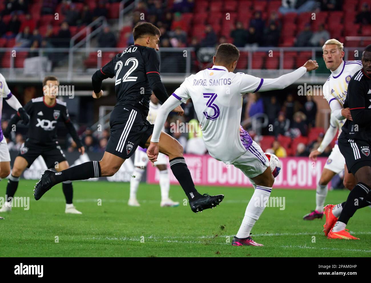 WASHINGTON, DC, USA - 11 MARCH 2023: Orlando City SC defender Rafael Santos (3) defends against DC United forward Yamil Asad (22) during a MLS match between D.C United and Orlando City SC, on  March 11, 2023, at Audi Field, in Washington, DC. (Photo by Tony Quinn-Alamy Live News) Stock Photo