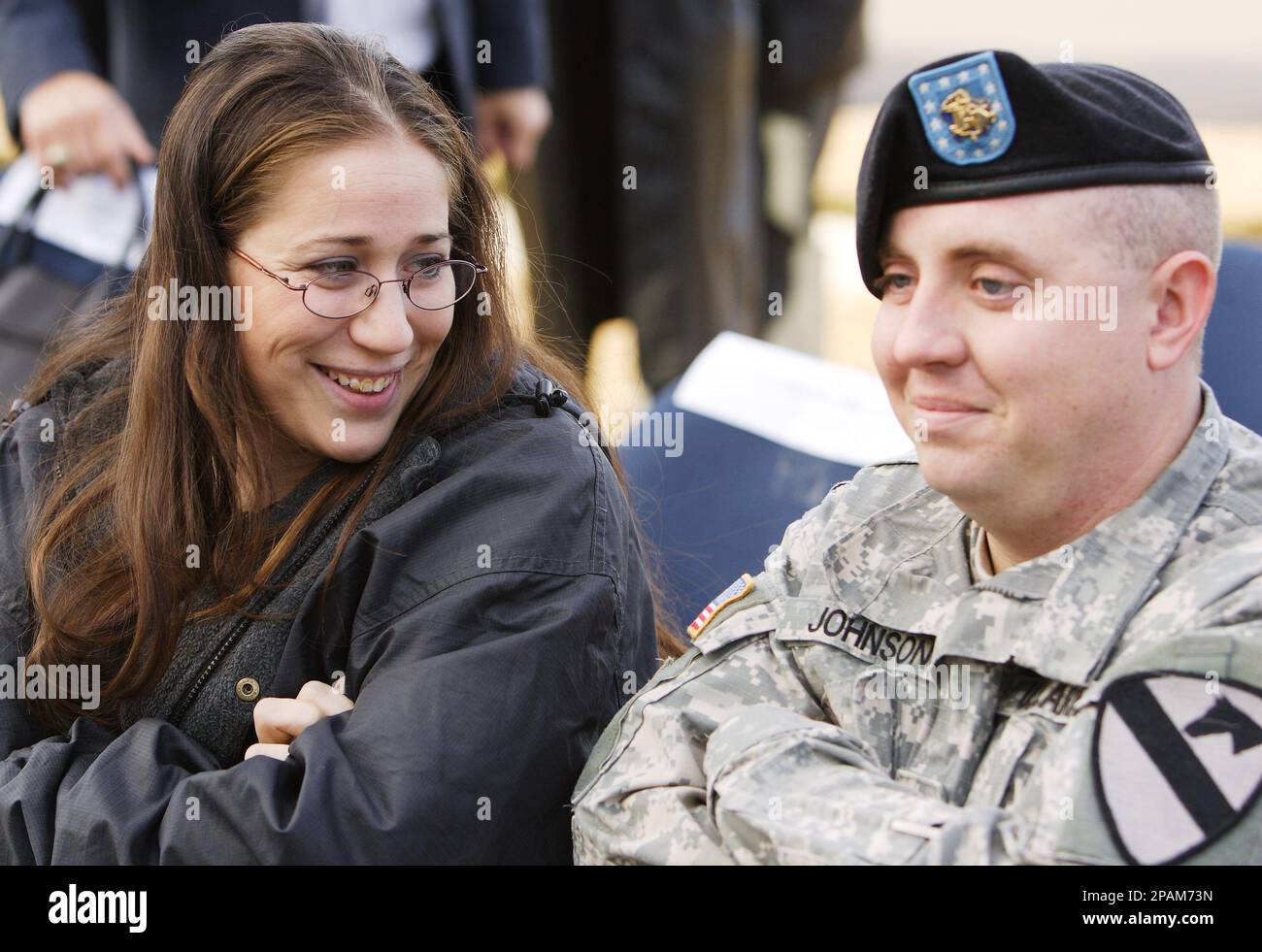 Army Spc. John Austin Johnson and his wife, Monalisa Johnson talk