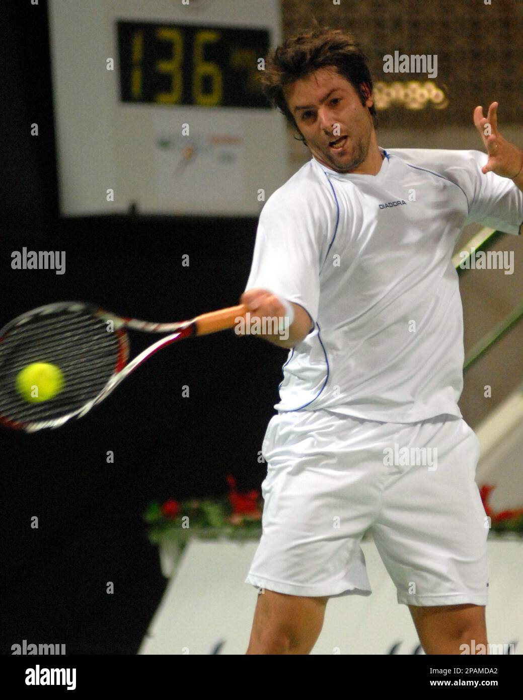 Agustin Calleri of Argentina in action against Tommy Robredo of Spain  during their first round match at the Qatar Open ATP Tour event in Doha on  Tuesday Jan. 1, 2008. (AP Photo/Abul