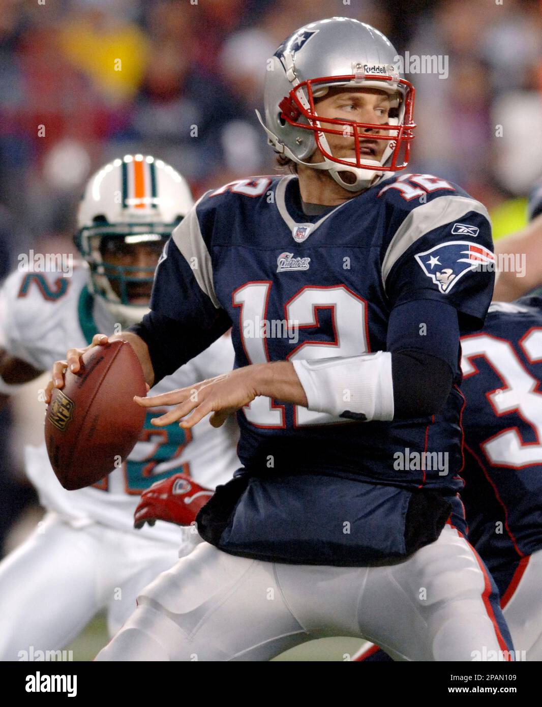 New England Patriots quarterback Tom Brady calls signals against the Miami  Dolphins at Landshark stadium in Miami on December 6, 2009 Stock Photo -  Alamy