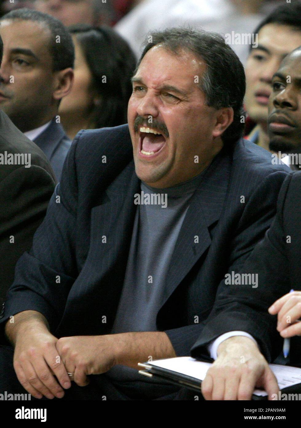Orlando Magic coach Stan Van Gundy yells to his players from the bench in the first half of