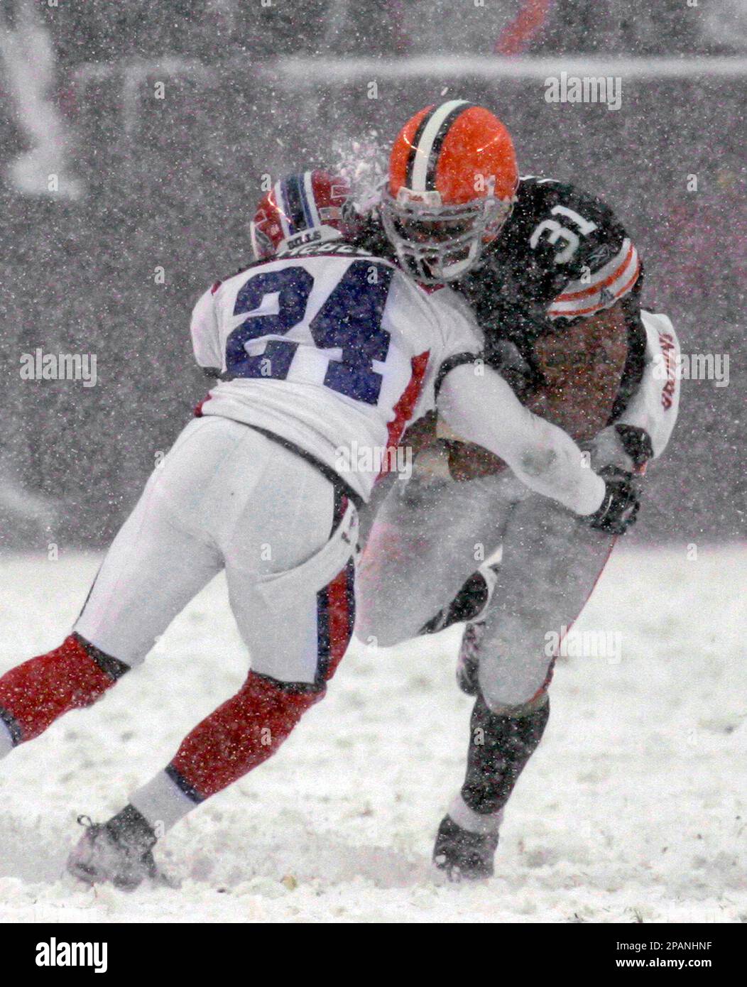 Cleveland Browns running back Terrence Magee (33) is stopped by Tampa Bay  Buccaneers defensive end George Johnson Jr., during the XX quarter of an  NFL preseason football game Saturday, Aug. 26, 2017