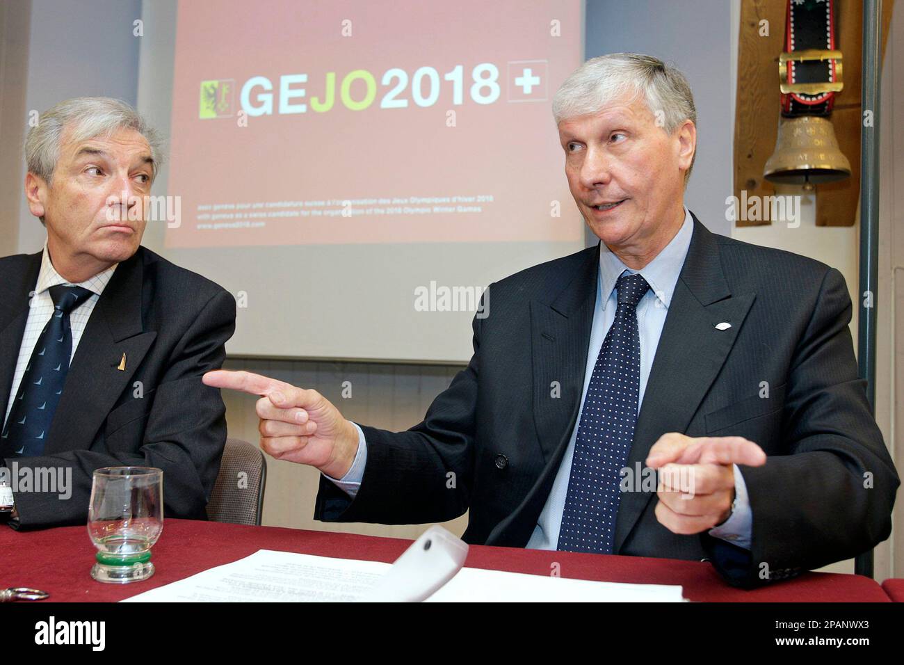 Marco Torriani, right, Chairman of the GEJO (Geneva Jeux Olympiques)  Exploratory Committee, sits next to Jean-Pierre Jobin, left, Member of the  GEJO (Geneva Jeux Olympiques) Exploratory Committee as they answer  journalist's questions