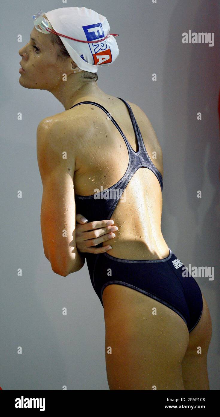 Swimmer Laure Manaudou from France watches a heat at the European Short  Course Swimming Championships in Debrecen, Hungary, Thursday, Dec. 13,  2007. (AP Photo/Michael Sohn Stock Photo - Alamy