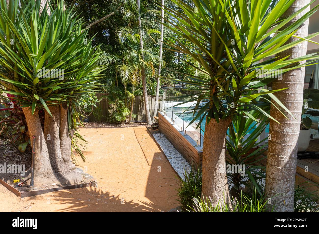 Sydney garden ready to receive new turf lawn, sand soil turf underlay on the ground ahead of