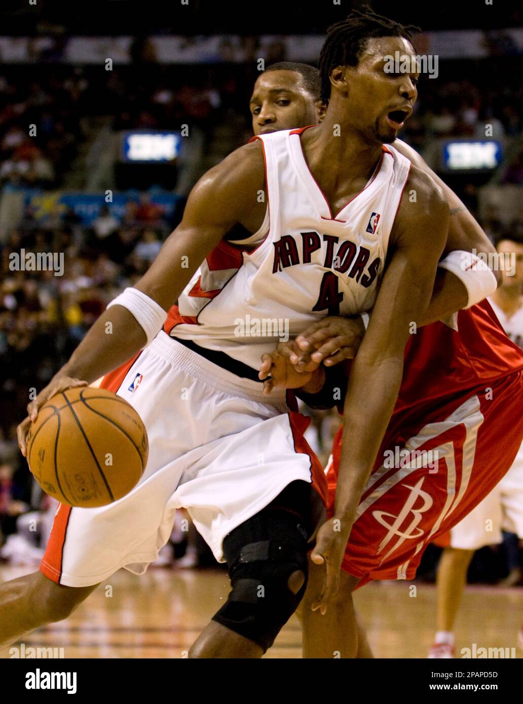 Toronto Raptors' Chris Bosh drives to the net as he is fouled by San  Antonio Spurs' Sean Marks during NBA action in Toronto, Wednesday Feb. 8,  2006. (AP PHOTO/CP, Adrian Wyld Stock