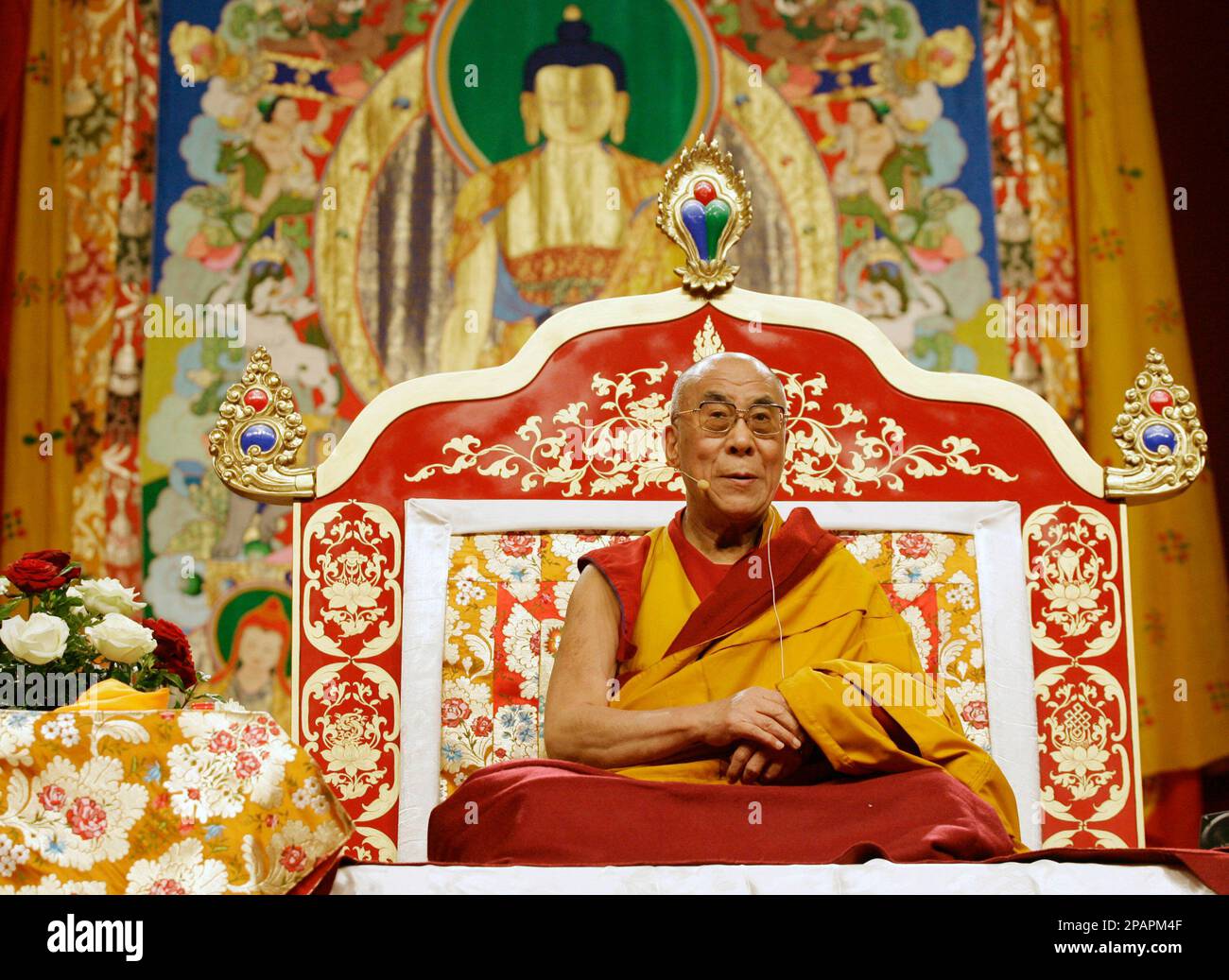 The Dalai Lama is seen at the beginning of a three-day teaching event called  \, image size:1300x1037