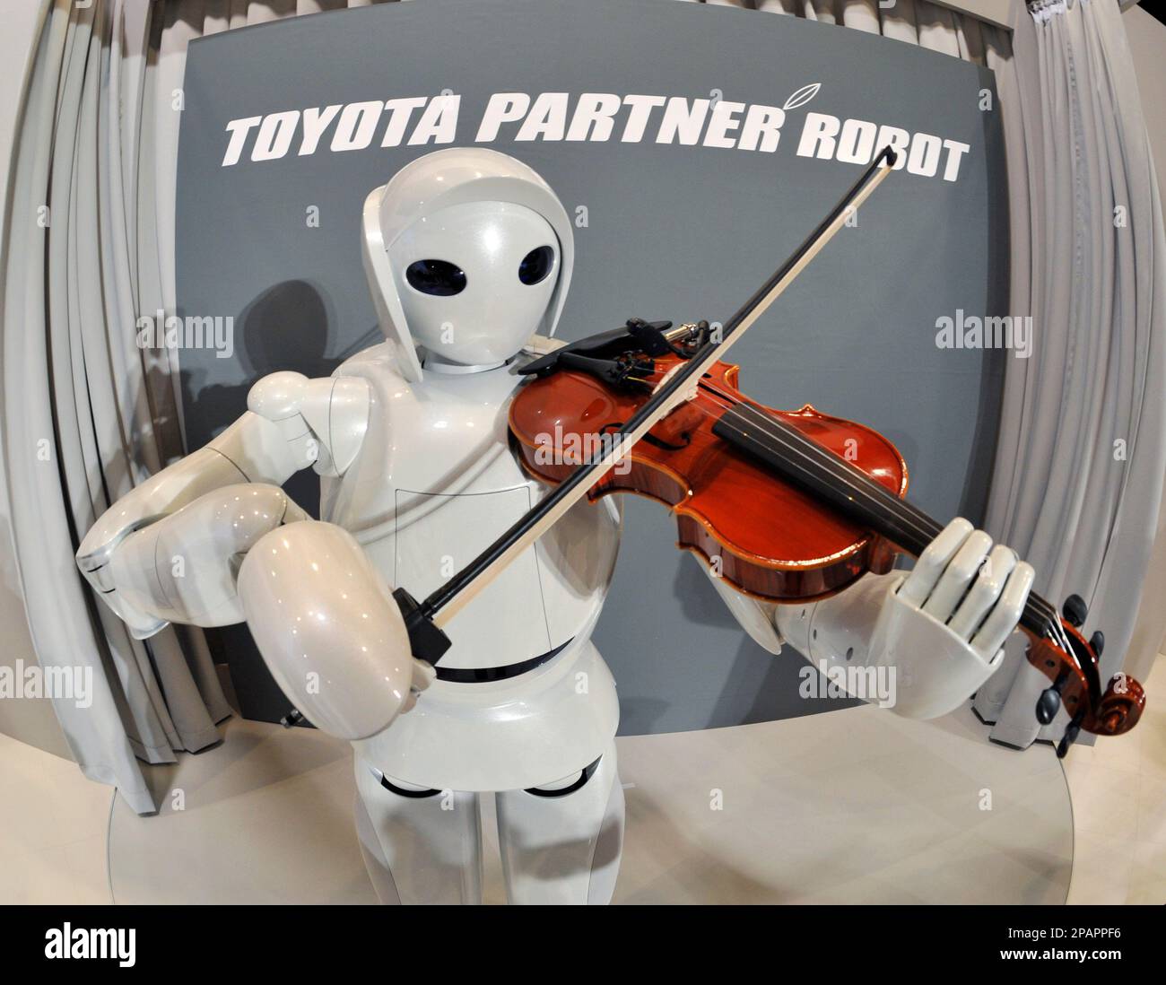 Toyota Motor Corp.'s new violin robot performs during a press unveiling