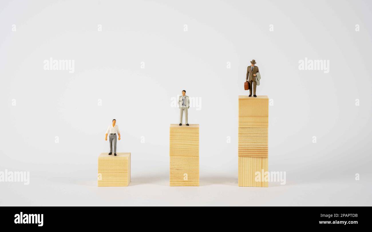Three male figures at different career development levels. The concept