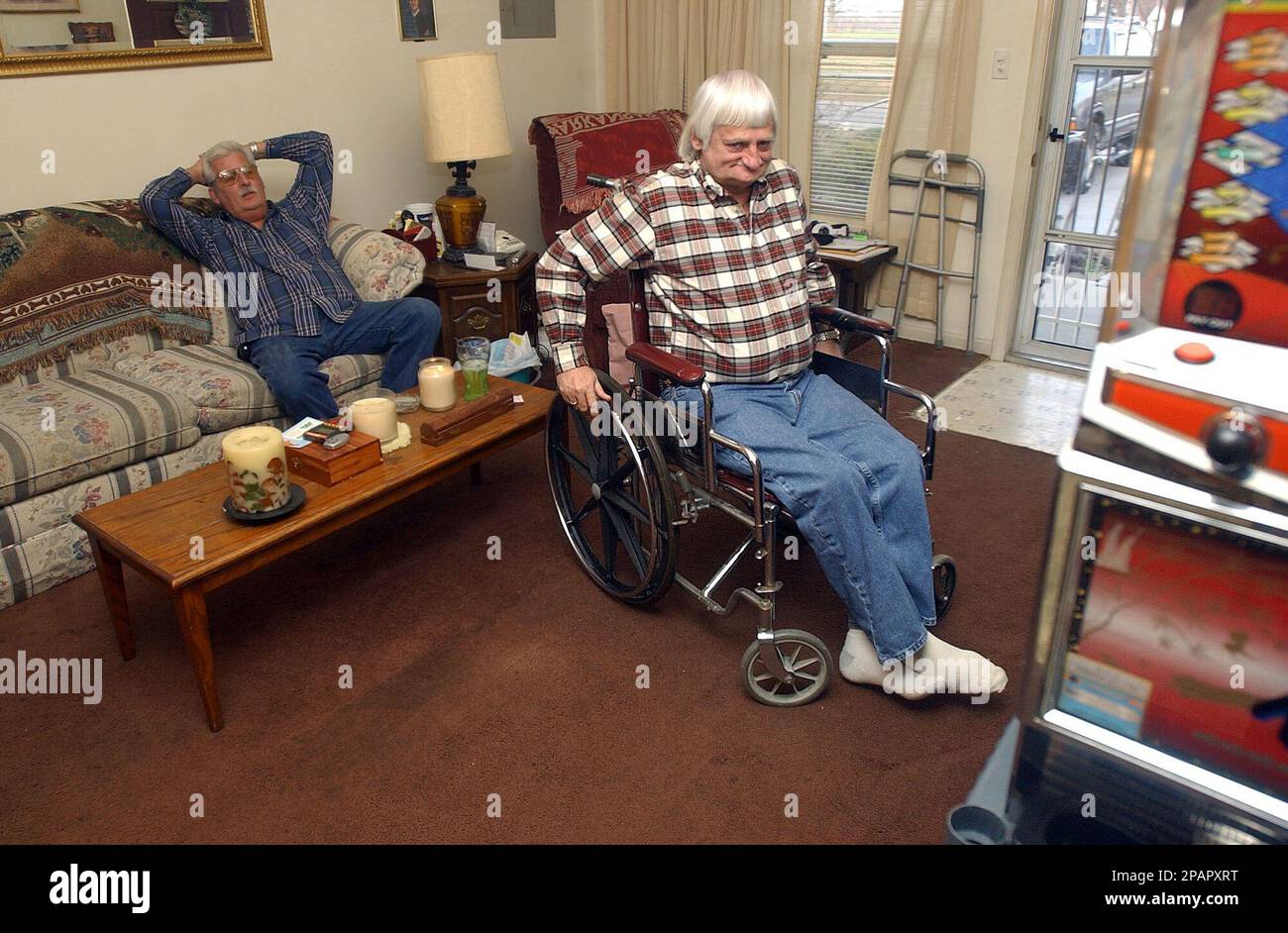 Wayne Aull, 55, uses a wheelchair for mobility at home with his brother, Bobby Aull, in