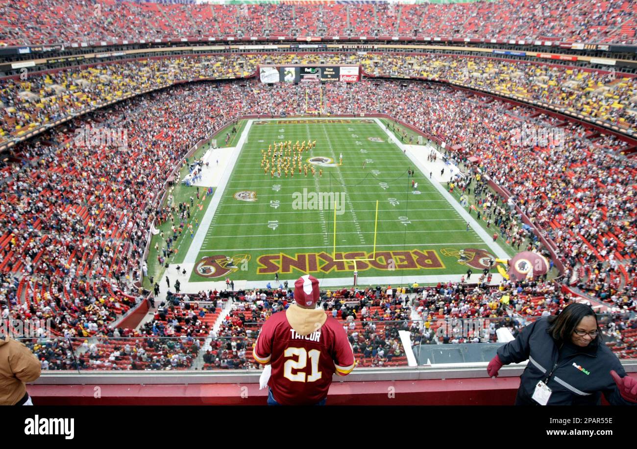 Washington Redskins football fan Bill Randall, foreground center, from  Washington, D.C., wears his Sean Taylor jersey before the start of the game  against Buffalo Bills, Sunday, Dec. 2, 2007, in Landover, Md.