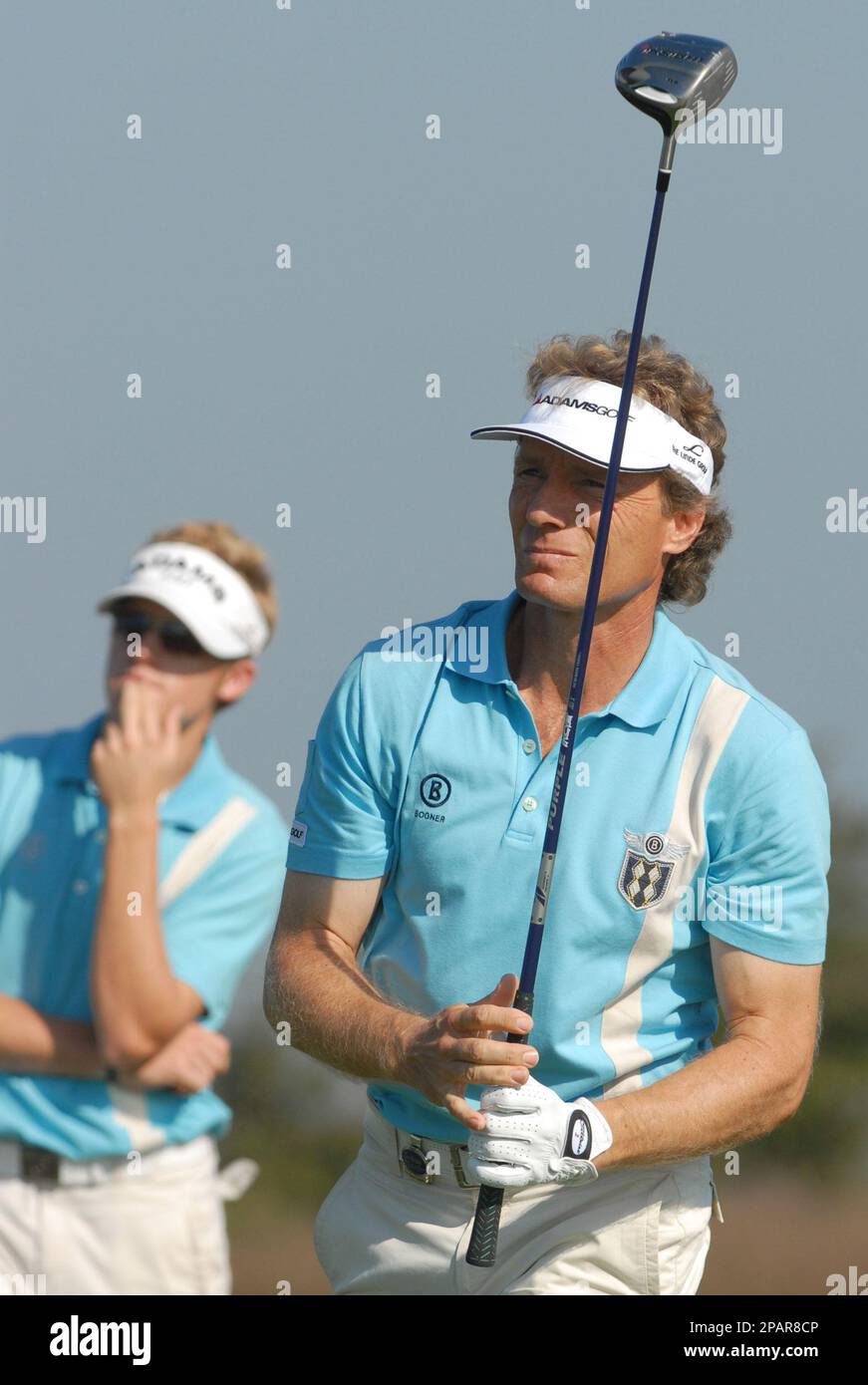 Stefan Langer, right, and his father, Bernhard Langer, of Germany, watch  his tee shot on the 15th hole during the final round of the Del Webb  Father/Son Challenge at ChampionsGate golf tournament