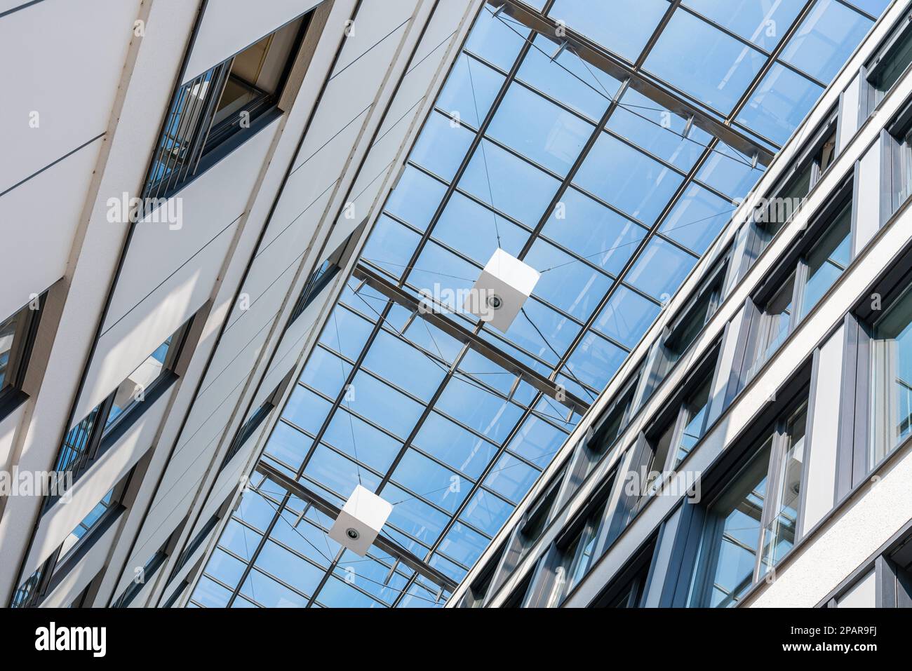 Glass roof between two buildings hires stock photography and images