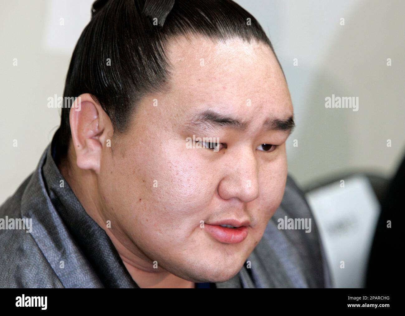 Mongolian Sumo Grand Champion Asashoryu speaks to reporters