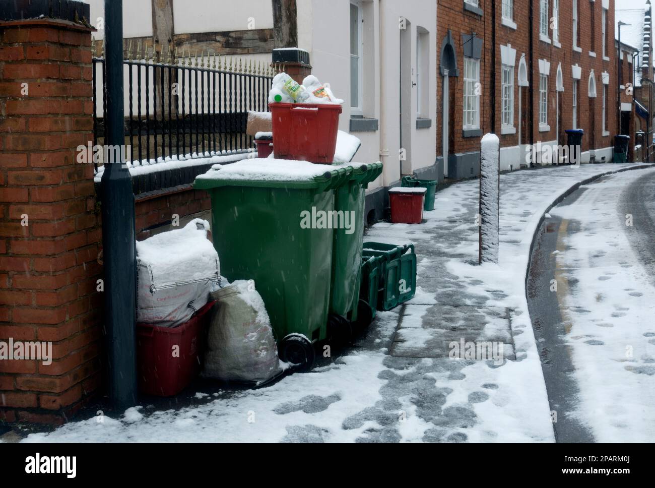 Recycling bins put out in snowy weather, Warwick, Warwickshire, UK Stock Photo Alamy