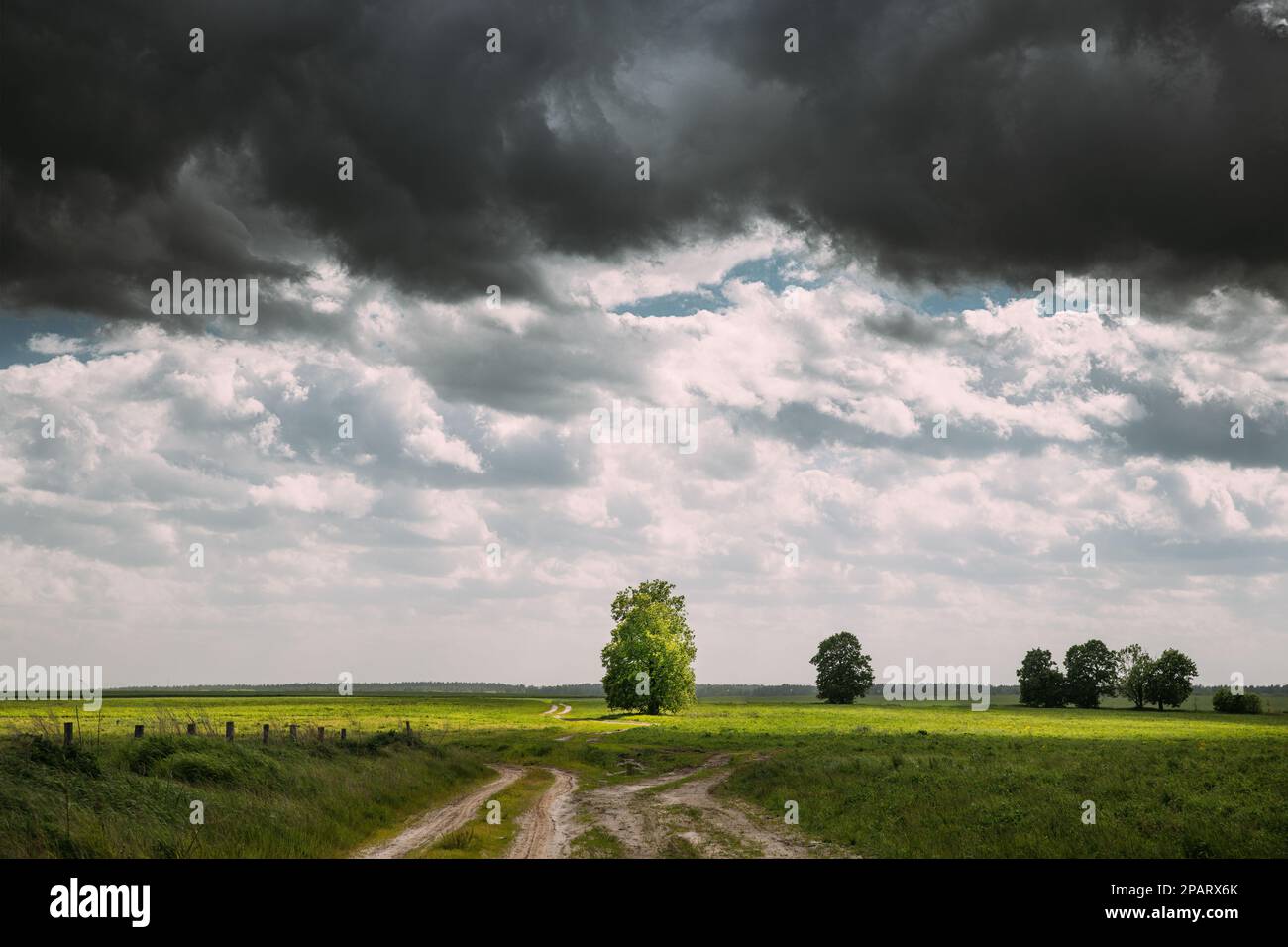 Dramatic Dark Sky On Horizon Above Rural Landscape Meadow. Heavy Rain ...