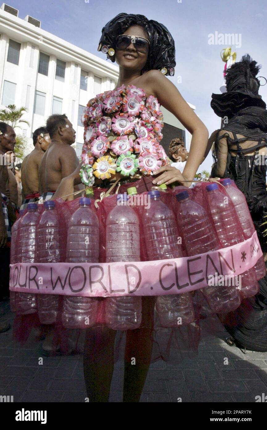https://c8.alamy.com/comp/2PARY7K/indonesian-model-displays-her-custom-made-dress-made-of-plastic-bottles-during-the-street-carnival-of-the-bali-fashion-week-in-kuta-bali-indonesia-sunday-nov-25-2007-the-islands-fashion-community-is-presenting-an-award-for-environmentally-friendly-design-ap-photofirdia-lisnawati-2PARY7K.jpg