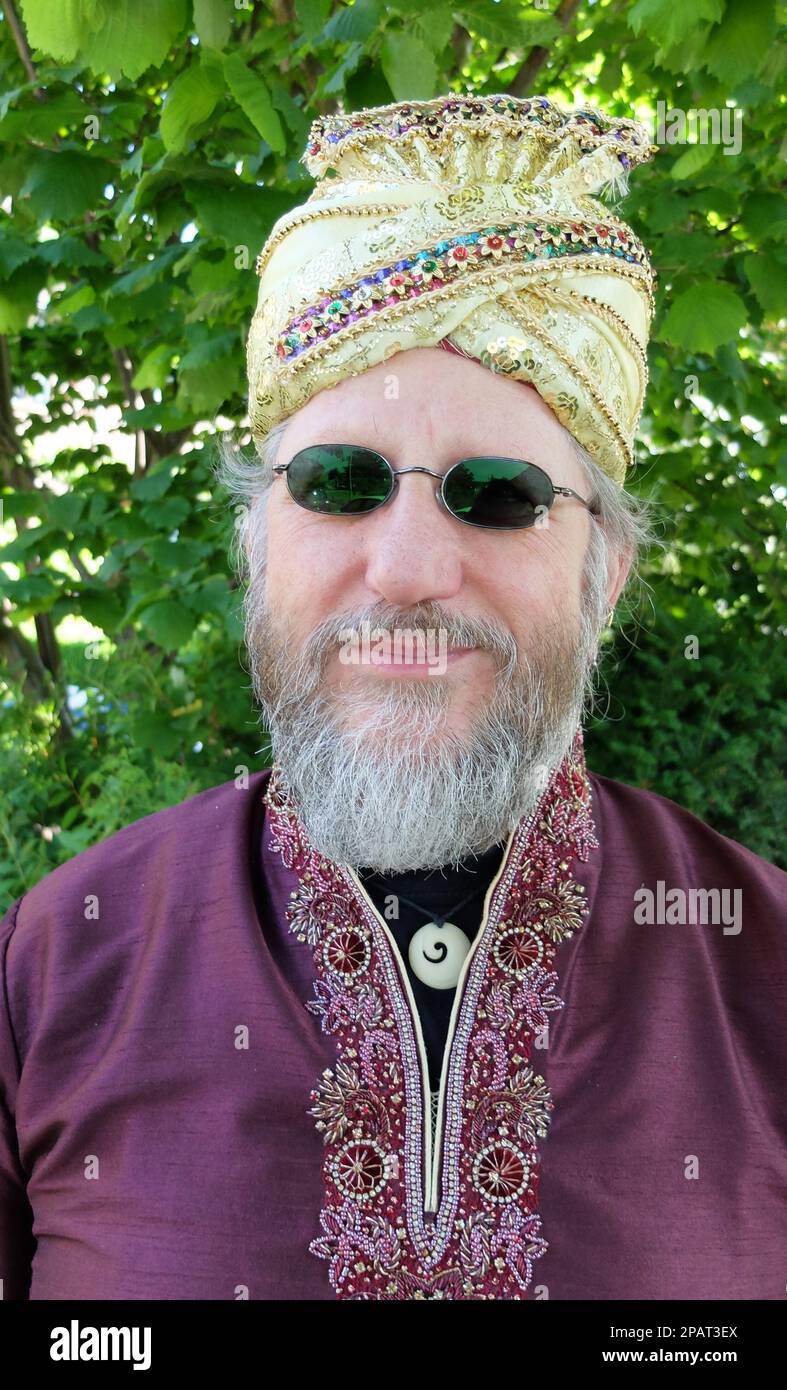 Man of 60 on his wedding day. He and his future wife have decided to wear Indian clothes on this day. Stock Photo