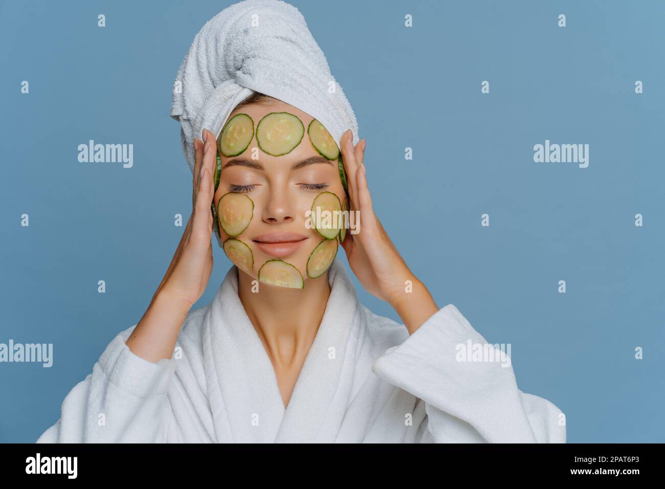 Beauty skin care anti aging concept. Relaxed European woman undergoes beauty treatments uses