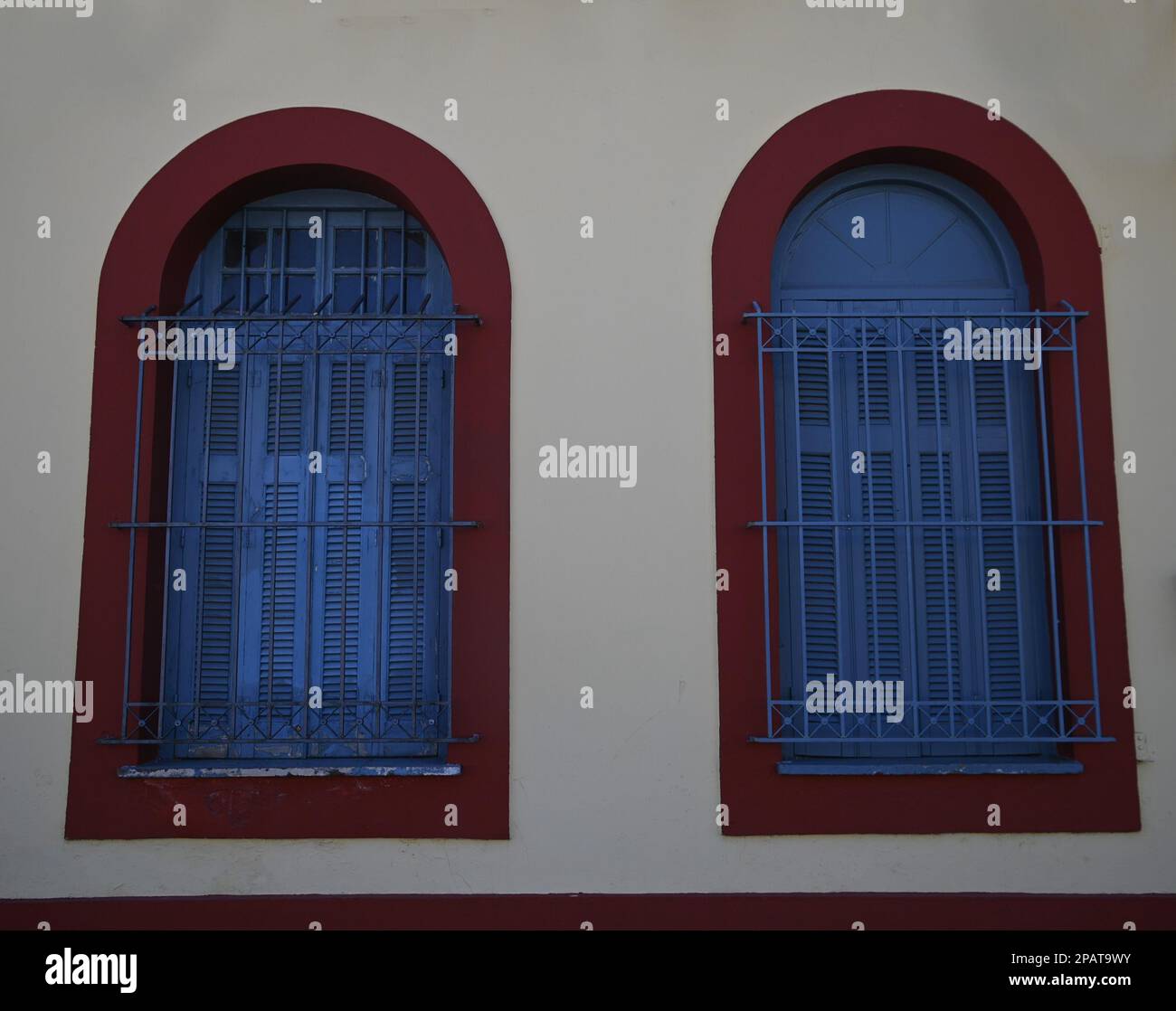 Old railway station arched windows on an ochre stucco wall Stock Photo ...
