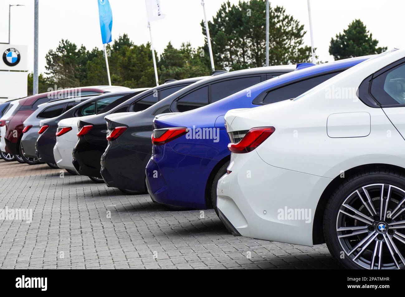 Selection of secondhand BMW crs for sale in a garage forecourt, UK Stock Photo