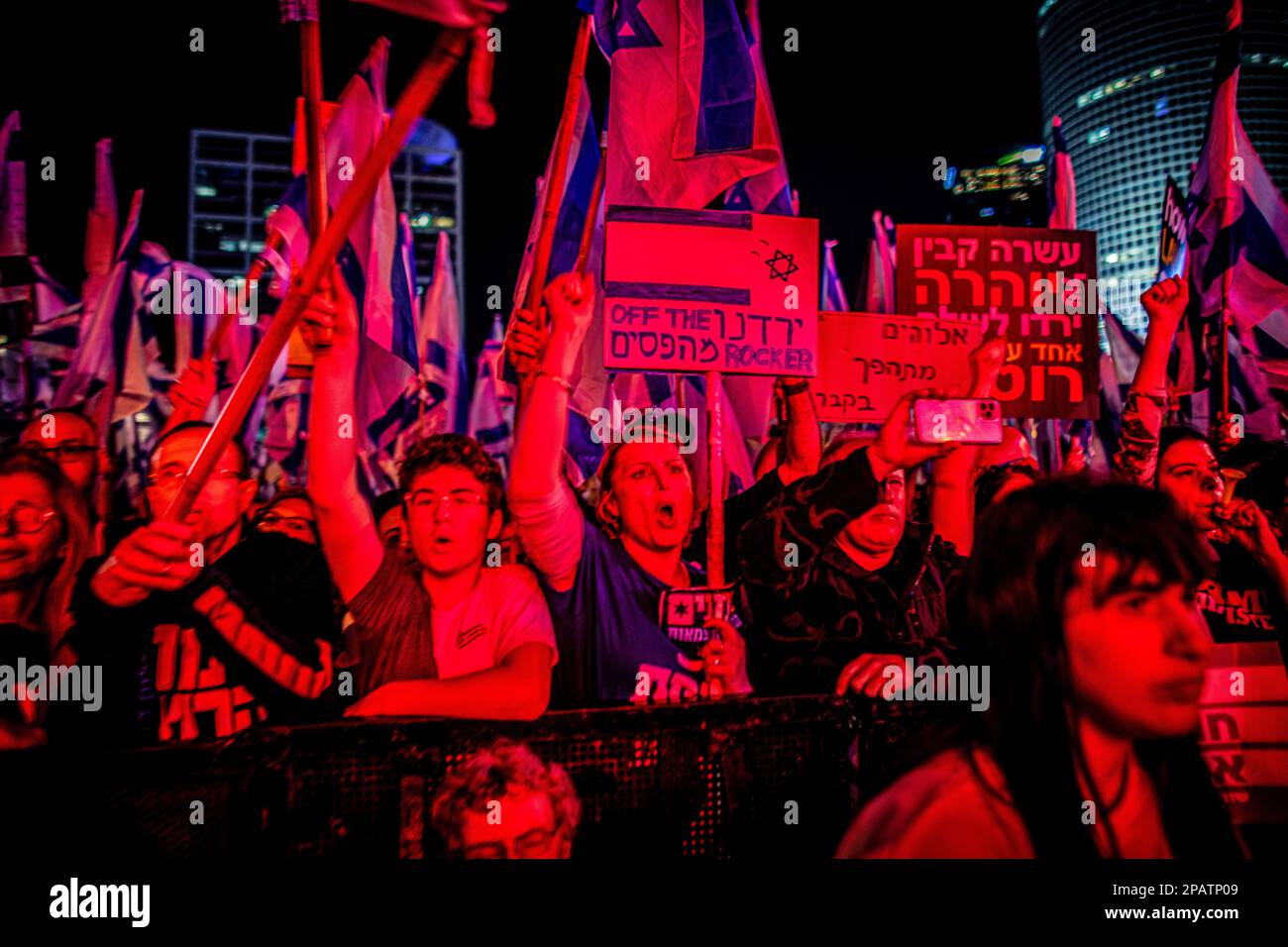 Tel Aviv, Israel. 11th Mar, 2023. Israeli pro democracy protesters chants slogans while holding placards and flags during the demonstration. Protesters took to the streets, as anti-judicial reform protests entered their tenth consecutive week. Credit: SOPA Images Limited/Alamy Live News Stock Photo
